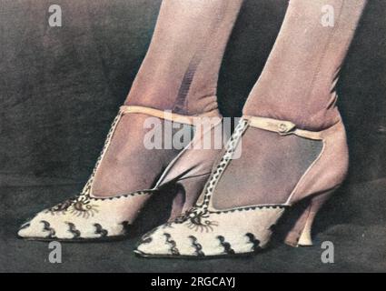 Close up photograph showing the elegant, embroidered T-bar shoes worn by Lady Elizabeth Bowes-Lyon for her wedding to Prince Albert, Duke of York on 26 April 1923. Stock Photo