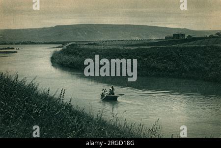 The outlet of the River Jordan from the Sea of Galilee Stock Photo