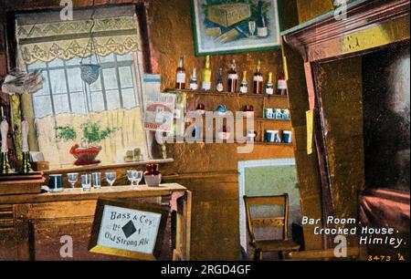 The Bar Room of the Crooked House, Himley, Staffordshire. During the early 19th century, mining in the area caused one side of the building to begin gradually sinking. It later (circa 1830) became a public house called the Siden House, siden meaning 'crooked' in the local Black Country dialect.The Crooked House is still run as a pub and restaurant. Stock Photo