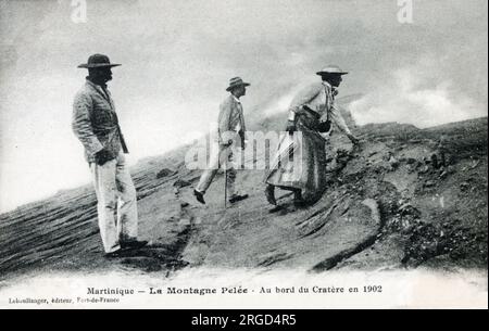 Martinique - Mount Pelee - (possibly rather unwise) tourists on the edge of the Volcano Crater. Stock Photo