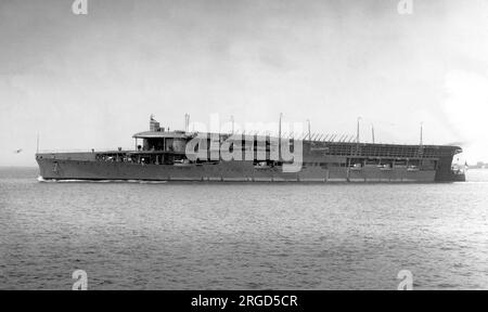 HMS Furious 47 aircraft carrier, a modified Courageous-class battlecruiser, seen in December 1931, with the removable con seen raised on the flight deck. This was removed for flying operations. Stock Photo