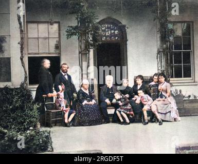 VICTOR HUGO and his family during their exile on Guernsey, 1866 : on his right is Juliette Drouet, on the left his grandchildren Jeanne et Georges. Stock Photo