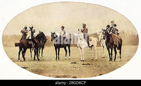 Tsar Nicholas II of Russia, seen here on (white) horseback with his two eldest daughters, Olga and Tatiana, in the uniforms of the regiments of which they were chiefs Stock Photo