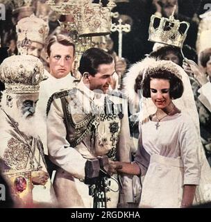 Wedding, at the Athens Metropolitan Basilica of the Annunciation, of eighteen year old  Princess Anne-Marie of Denmark and twenty-four year old King Constantine of Greece.  The ceremony was presided over by Archbishop Chryssostomos, Primate of the Greek Orthodox Church.  Prince Philip, Duke of Edinburgh represented the Queen and Princess Anne was bridesmaid. Stock Photo