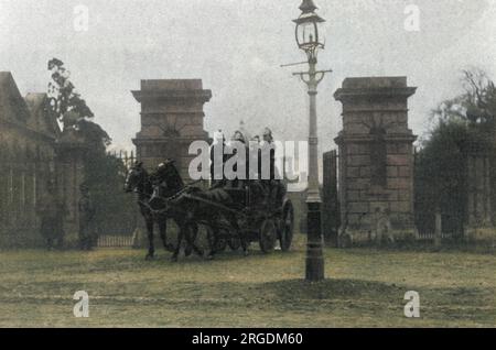 A fire engine leaving the main gates of the Middlesex Pauper Lunatic Asylum at Colney Hatch, near Friern Barnet, Middlesex (North London), 1903. Stock Photo