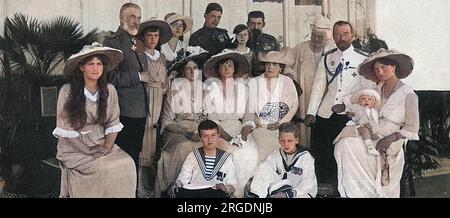 The Russian and Romanian royal families, pictured during the former's visit to Constanza, on the Romanian coast. From left, going around the back: Grand Duchess Maria of Russia, Carol I, King of Romania, Grand Duchess Anastasia of Russia, Princess Marie of Romania, Prince Carol of Romania, Crown Prince Ferdinand of Romania, Queen Elizabeth of Romania, Czar Nicholas II, Grand Duchess Tatiana of Russia with the baby Prince Mircia of Romania. Seated in the centre are the Czarina of Russia, Grand Duchess Olga of Russia, Princess Ileana of Romania, Crown Princess of Romania. Sitting at the front ar Stock Photo