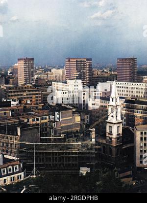 A fine view of the City of London, from St. Paul's Cathedral, showing St. Vedast's Church, looking towards the Barbican and new buildings under construction. Stock Photo