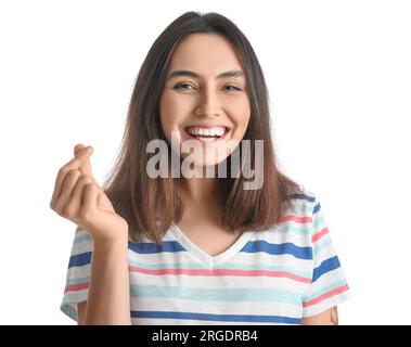 Happy young woman snapping fingers on white background, closeup Stock Photo