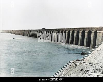 The Assiut or Asyut Barrage damming the River Nile in Egypt (seen here from downstream), about 350 miles downstream of the Aswan Dam. Designed by British engineer Sir William Willcocks, who also designed the Aswan Dam, it was built between 1898 and 1903. Stock Photo