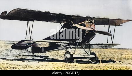 A German Fokker D VII fighter plane on an airfield towards the end of the First World War. It had a 180 hp Mercedes engine, and was a single-seat fighter plane.  Damage by machine gun bullets can be seen on the radiator. Stock Photo