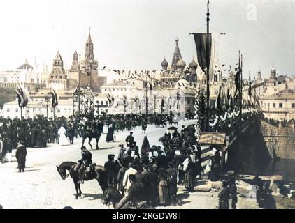 Tsar Nicholas II of Russia was crowned on the 26th of May 1896, this parade on the Kamenny Bridge in Moscow, is a small glimpse of the celebratory mood said to have captivated the Russian people. Stock Photo