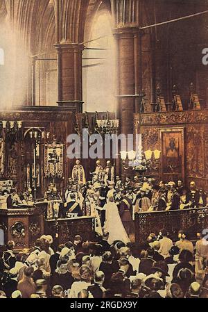 Scene inside Westminster Abbey showing the royal wedding of 1923, with Prince Albert, Duke of York (later King George VI) stood at the altar with his bride, Lady Elizabeth Bowes-Lyon.  To the right of the couple can be seen the royal family including King George V, Queen Mary, Queen Alexandra, Prince George (future Duke of Kent), Empress Marie of Russia and Princess Victoria. Stock Photo
