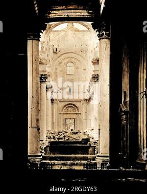 View of the interior of Arras Cathedral after German shell fire, on the Western Front in France during World War One, taken from the altar at the east end. Stock Photo