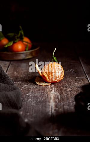Clementines on a wooden table Stock Photo