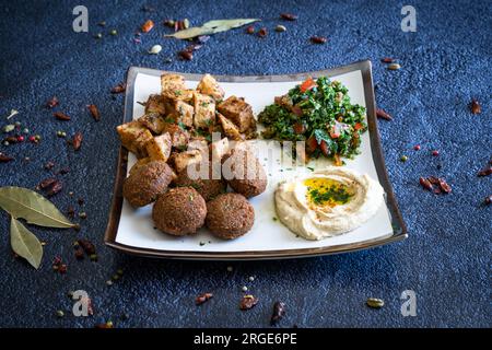 Famous falafel houmous and orienal mixed plate Stock Photo