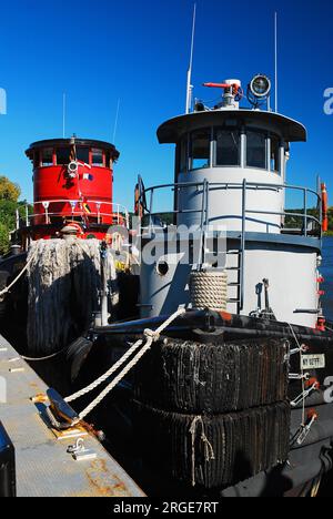 Historic tugboats are moored at the Maritime Museum in Kingston, New York Stock Photo