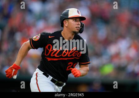 Ramon Urias of the Baltimore Orioles triples against the Houston