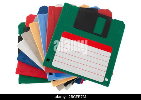 Colored old retro floppy diskettes in stack. Isolated on white background. Stock Photo