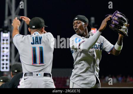 Miami Marlins Luis Arraez (3) with first base coach Jon Jay (11) during a  spring training baseball game against the Boston Red Sox on March 5, 2023  at JetBlue Park in Fort
