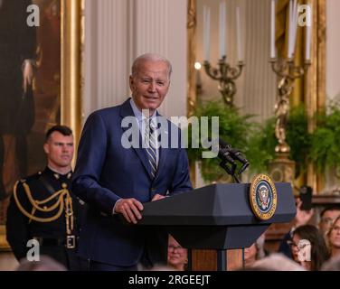 WASHINGTON, D.C. — August 7, 2023: President Joe Biden delivers remarks in the East Room of the White House. Stock Photo