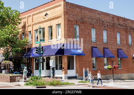 Hendersonville North Carolina,Main Street,family parent mother,son daughter boy girl,child children childhood,kid female male,resident,brother sister Stock Photo