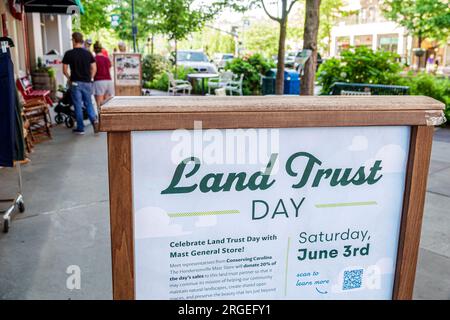 Hendersonville North Carolina,Main Street,Land Trust Day,protecting natural resources,sign information Stock Photo