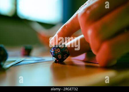 Using d20 dice as a life counter when playing trading card game Stock Photo