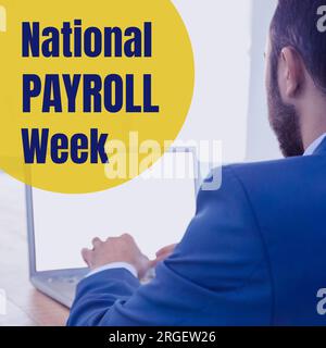 National payroll week text on yellow over biracial businessman using laptop Stock Photo