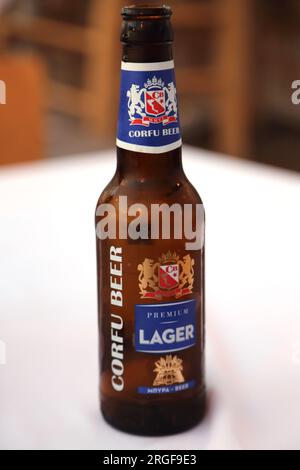 Vouliagmeni Athens Greece a Bottle of Corfu Beer Stock Photo