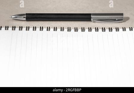 Empty Notepad with pen. Opened spiral notebook Stock Photo
