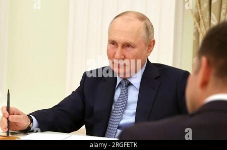 Moscow, Russia. 08th Aug, 2023. Russian President Vladimir Putin listens during a meeting with the heads construction industries at the Kremlin, August 8, 2023 in Moscow, Russia. Credit: Mikhail Klimentyev/Kremlin Pool/Alamy Live News Stock Photo