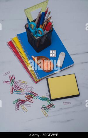 School accessories on a white background. View from above.back to school concept. Stock Photo
