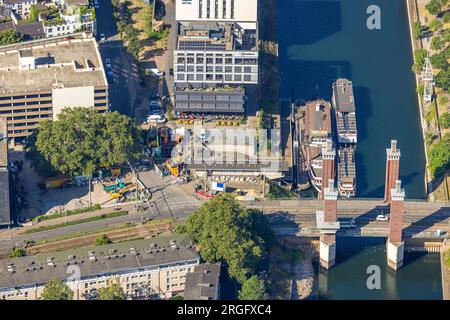 Aerial view, ships White Fleet at the Swan Gate Bridge, Inner Harbour, construction site at Unterstraße, Kaßlerfeld, Duisburg, Ruhr Area, North Rhine- Stock Photo