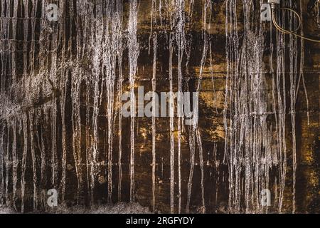 rusty surface with limescale or paint residue from running water Stock Photo
