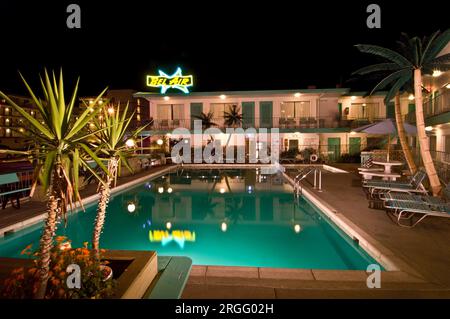 Bel Aire Motel, Pool at Night with Large Neon sign and Palm Trees, Wildwood, NJ Stock Photo