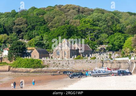 12th century Saint Brélade's Church from Saint Brélade's Bay Beach, St Brélade Parish, Jersey, Channel Islands Stock Photo