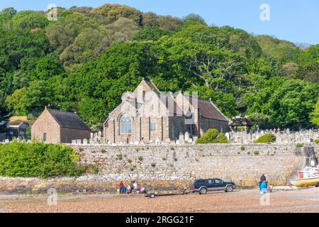 12th century Saint Brélade's Church from Saint Brélade's Bay Beach, St Brélade Parish, Jersey, Channel Islands Stock Photo