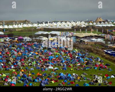 Boardmasters Festival of music, surfing and skating. Newquay gives a wet start.  Rain and mist greet early arrivers. A record 53,000 fans are expected as only day tickets for Friday are still available. Sponsors include Coca Cola, Thatchers cider, Lidl, Brewdog, Jagermeister, Acts include, Liam Gallagher, Florence and the machine, Ben Howard, Little sims, Rudimental and Dermot Kennedy.  Newquay,  Cornwall  UK. 9th August 2023. Robert Taylor/Alamy Live News Stock Photo