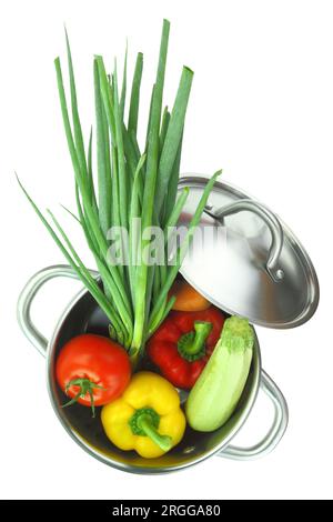 Fresh vegetables into a cooking pot isolated on white transparent background Stock Photo