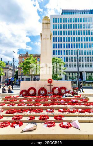 Manchester Cenotaph memorial with laid poppy wreaths St Peter's Square, Manchester, England, UK Stock Photo