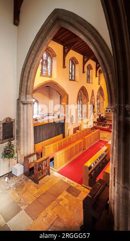 Sanctuary and altar at St Dionysius christian church, dating from the thirteenth century, in the town centre of Market Harborough, England. Stock Photo