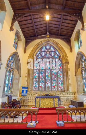 Sanctuary and altar at St Dionysius christian church, dating from the thirteenth century, in the town centre of Market Harborough, England. Stock Photo