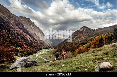Young couple hiking in mountains Stock Photo