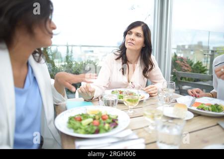 Businesswomen at a meeting in a restaurant Stock Photo