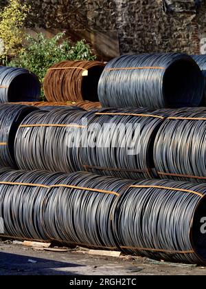 Coils of wire in a storage bin for processing Stock Photo