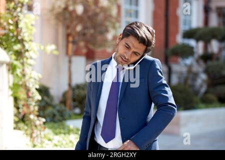 Businessman talking on smart phone Stock Photo