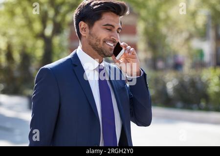 Businessman talking on smart phone Stock Photo