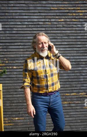 Senior man on phone call Stock Photo