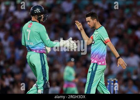 London, England. 9th August, 2023. Oval Invincibles' Nathan Sowter celebrates after dismissing Manchester Orginals' Jos Buttler with Sam Billings during the Hundred match between Oval Invincibles vs Manchester Originals at the Oval. Credit: Ben Whitley/Alamy Live News Stock Photo