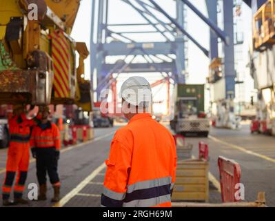 Dock worker in hardhat at Port of Felixstowe, England Stock Photo